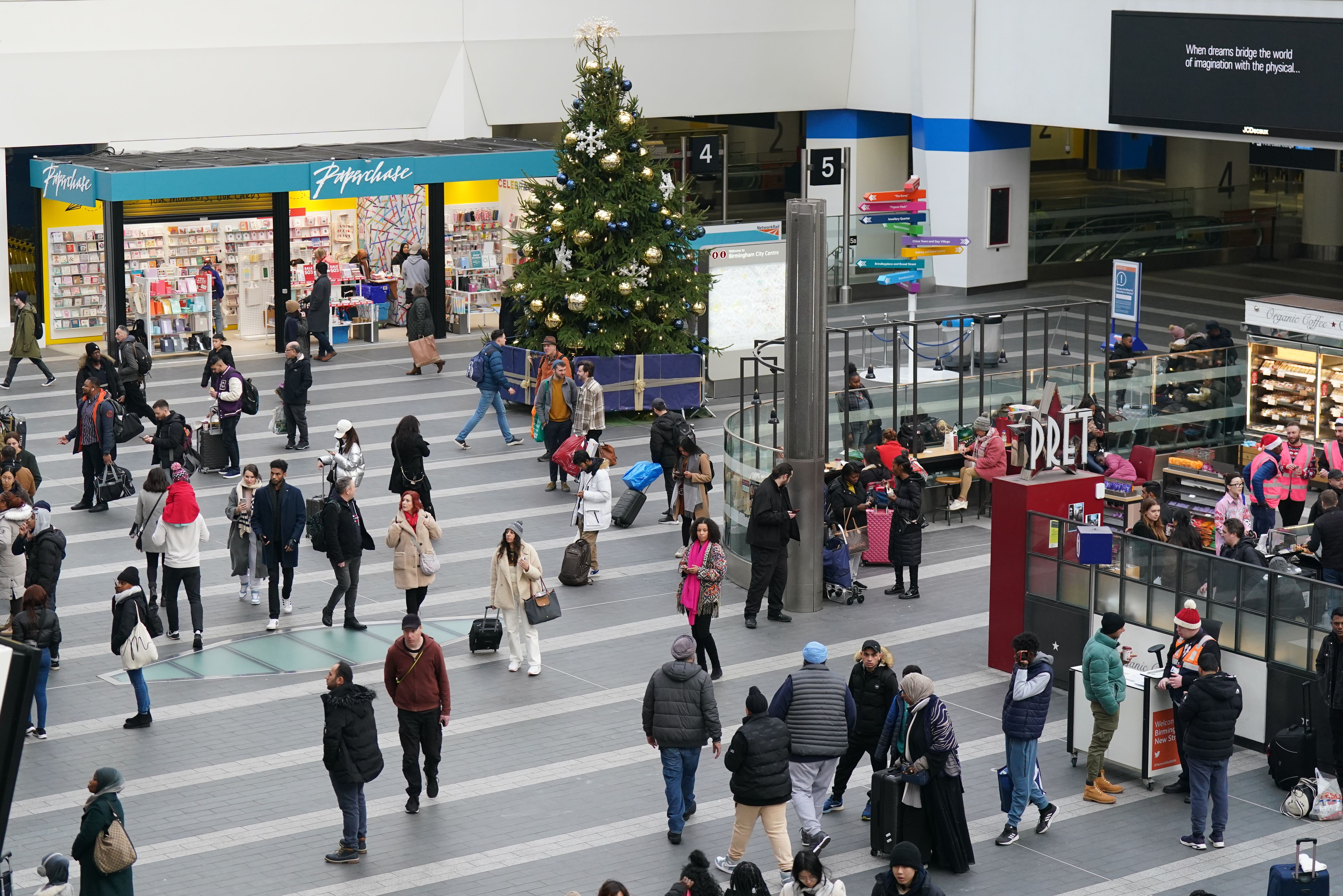 Passengers wait on the concourse at Birmingham New Street station (Jacob King/PA)